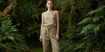 Model in stylish eco-friendly clothing, embodying sustainable fashion's future